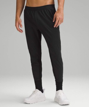 Pantalon Jogger Lululemon Surge Híbrido Hombre Negras Chile | 124NPAELW