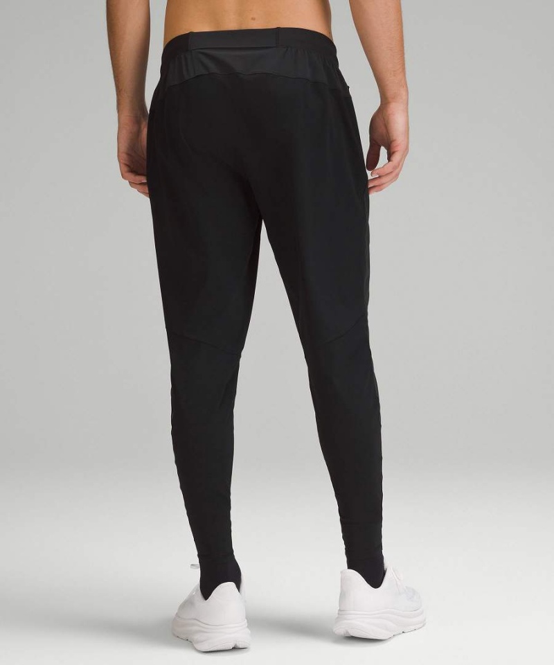 Pantalon Jogger Lululemon Surge Híbrido Hombre Negras Chile | 124NPAELW